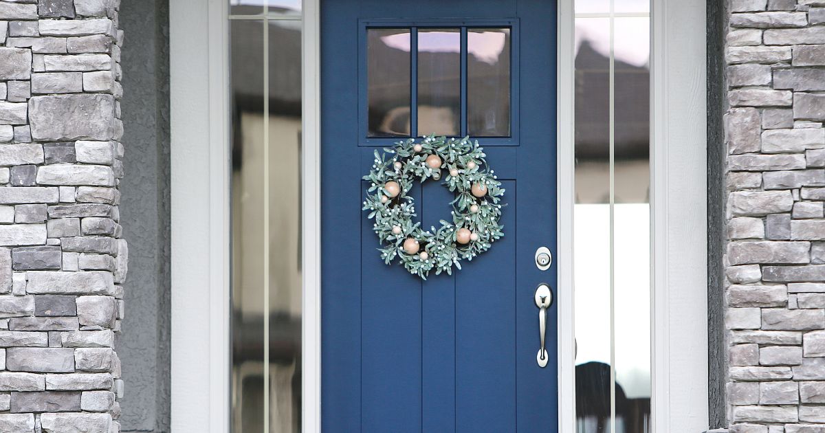 Blue front door on house