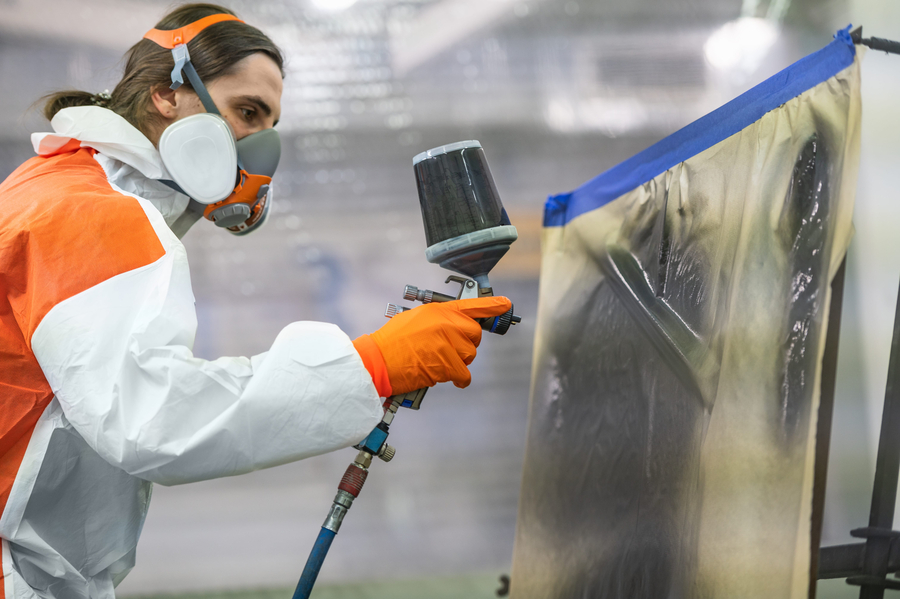 electrostatic paint expert working on on site electrostatic painting